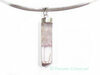 Kunzite rose brute naturelle en pendentif